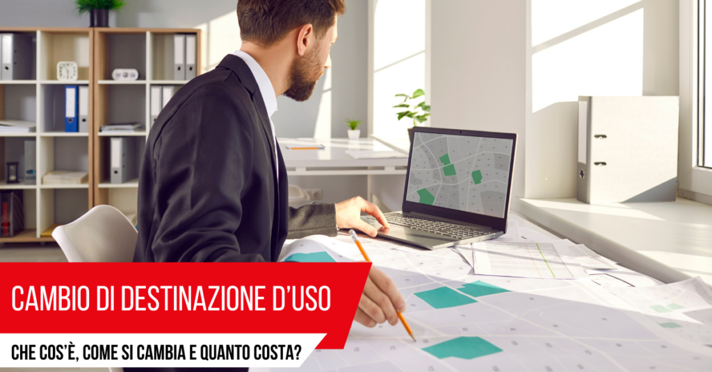 Un'immagine che ritrae dispositivo elettronico, tavolo, mobilia, impiegato e attrezzature per ufficio.