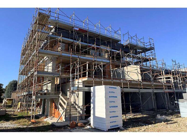 Un'immagine che ritrae impalcature, costruzione, materiale composito, ingegneria e cemento armato.